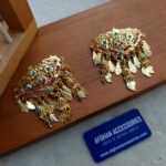 Gold Tasni brooch hair accessory